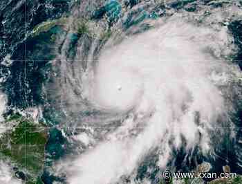 What is 'rapid intensification' during tropical development?