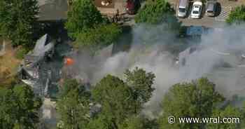 4 townhomes damaged, cat rescued after fire rips through Raleigh complex