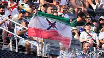 Iranian fans may boo the national anthem, but support the team