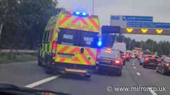 Man fights for life after fall from bridge over M60 near Manchester sparking huge 999 response