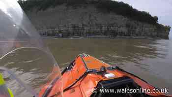 Dramatic rescue as five people cut off by tide