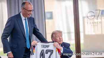 Nach scharfen Attacken: Merz überrascht Trump mit DFB-Trikot