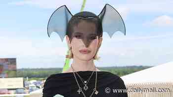 Kelly Osbourne pays tribute to her late rocker father Ozzy with a bat-shaped fascinator and all black outfit as she arrives at day one of Royal Ascot