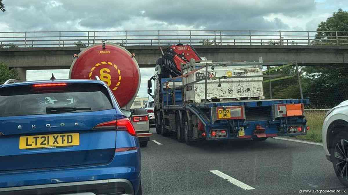 Double decker bus fire and 'extensive spillage' closes lanes on M58 - live updates
