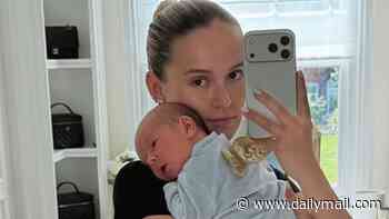 Molly-Mae Hague says she's 'one lucky mummy' as she poses with newborn son Midas after revealing she's back in a size 10 dress less than two weeks on from giving birth