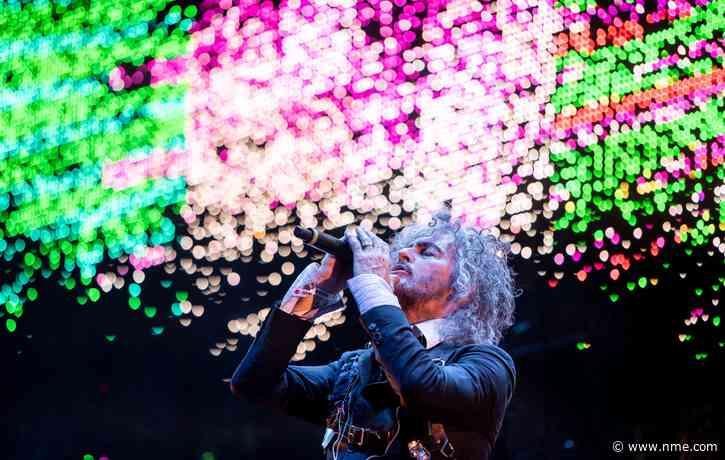 Flaming Lips cancel show as they share photo of Wayne Coyne hospitalised with pneumonia