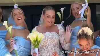 Perrie Edwards dances in her bridal pyjamas before transforming into lace wedding gown in fun video after marrying Alex Oxlade-Chamberlain