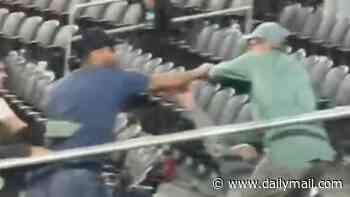 Fears rise over World Cup violence as Iran fans brawl in the stands and exec claims FIFA has 'lost control' of tickets