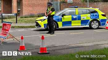 Three held as cordon remains over suspect device