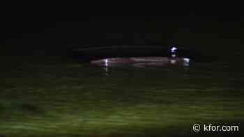 Three rescued, one arrested after car drives into NE OKC pond