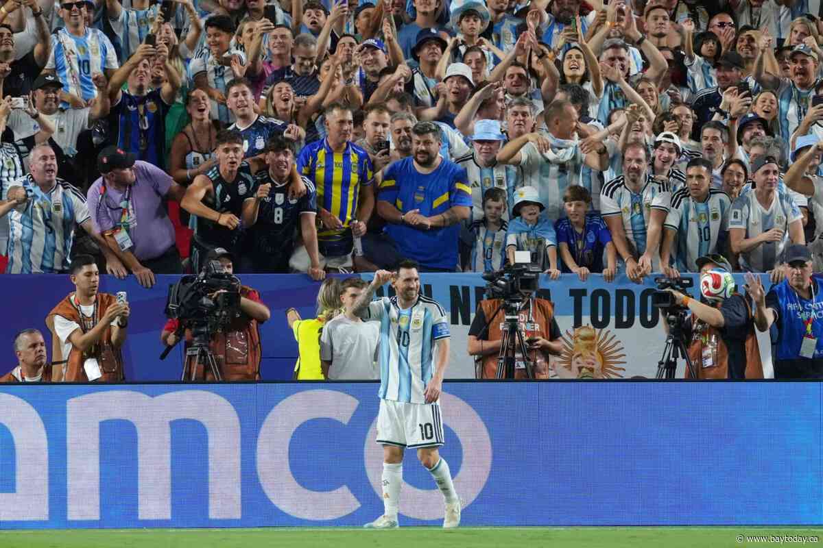 Lionel Messi ties Klose's World Cup goals record with his first hat trick as Argentina tops Algeria