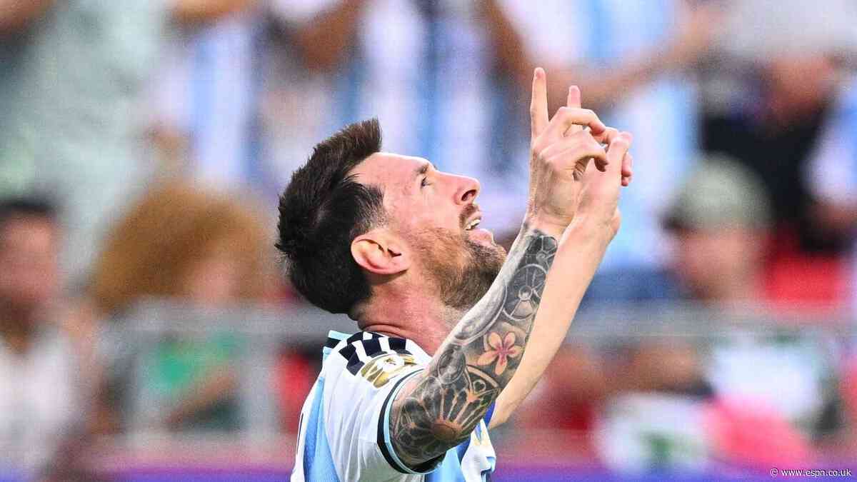 On the World Cup's day of stars, Messi towers over...