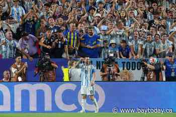 Lionel Messi ties the World Cup goals record with an incredible hat trick as Argentina tops Algeria
