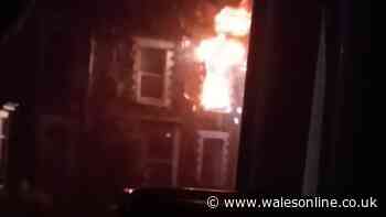 Man arrested after fire tears through home