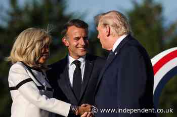 Trump gives Brigitte Macron long ‘tug of war’ handshake during G7 summit