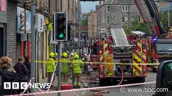 Firefighters tackle blaze near flats in Edinburgh