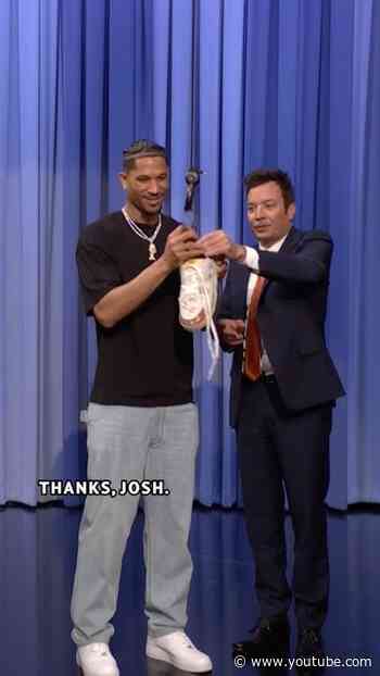 #JoshHart honors Jimmy’s untied shoe by signing it and retiring it to the rafters 😭 #FallonTonight