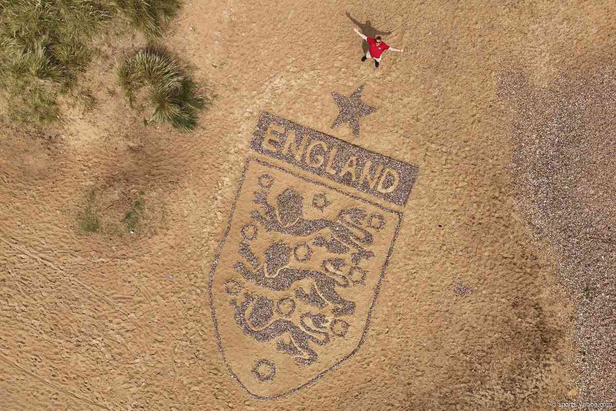 Artist creates 30-foot England badge on Suffolk beach ahead of World Cup clash