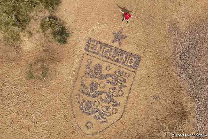 Artist creates 30-foot England badge on Suffolk beach ahead of World Cup clash