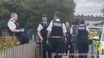 Arrest after man spotted with 'trousers down' near Huyton school