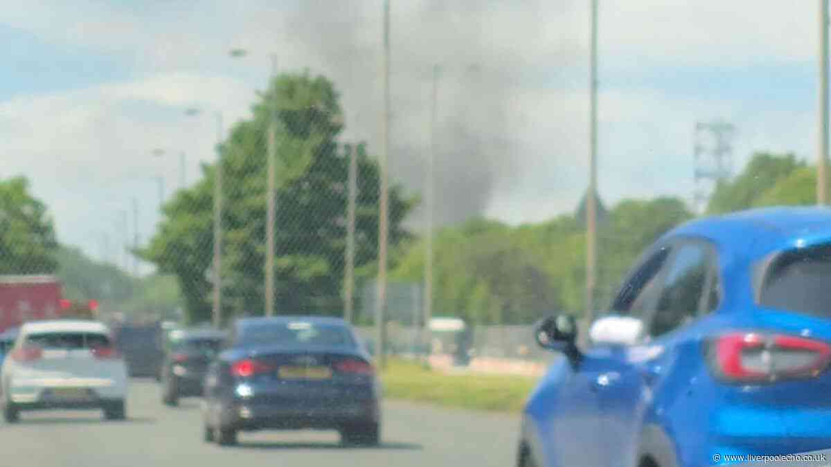 Staff evacuated from Fazakerley shop as smoke fills the air