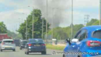Staff evacuated from Fazakerley shop as smoke fills the air