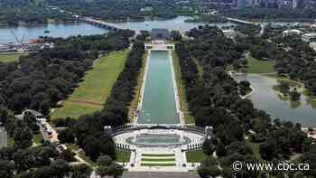 Trump spent $14M US to make reflecting pool look blue. Now the water is green