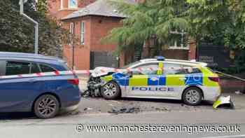 Woman taken to hospital after crash involving police car in Didsbury