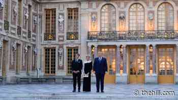 Live updates: Trump defends details in MOU with Iran; Macron entertains at Palace of Versailles