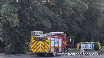 Liverpool main road closed after police car flips onto side in crash- recap