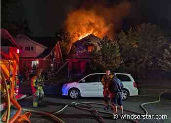 Photos: Fire crews battle blaze at boarded up west Windsor house