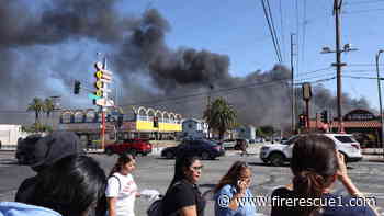 LAFD crews battle warehouse fire involving solar panels, ammonia leak