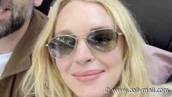 Lindsay Lohan gives rare glimpse at family life in Dubai with son, two, as she celebrates husband's 40th birthday
