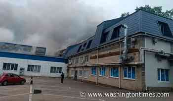 Smoke rises over Moscow after Ukrainian drones hit an oil refinery
