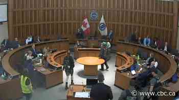 Protesters disrupt regional council meeting over Kitchener encampment decision
