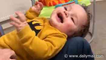 The happy and playful baby boy who never stood a chance: Heartbreaking videos show giggling Preston Davey months before he was abused and murdered at hands of adoptive father