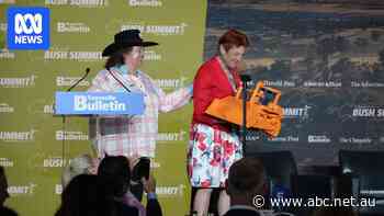 An orange bulldozer is ploughing through the political arena