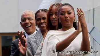 Malia and Sasha Obama laugh at dad Barack's gray hair on stage at Obama Presidential Center opening