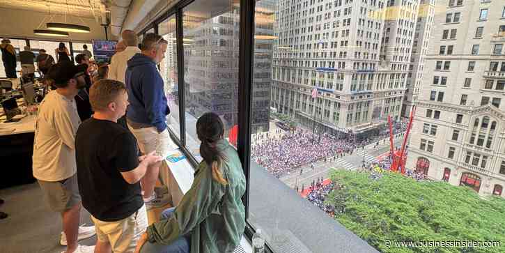 The hottest office perk in NYC today: a front-row view of the Knicks parade