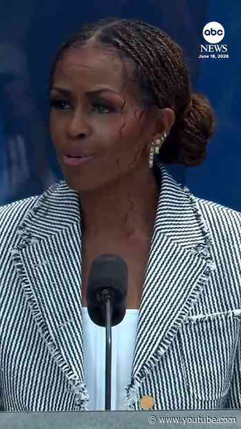 Michelle Obama pays tribute to Barack at opening of presidential center