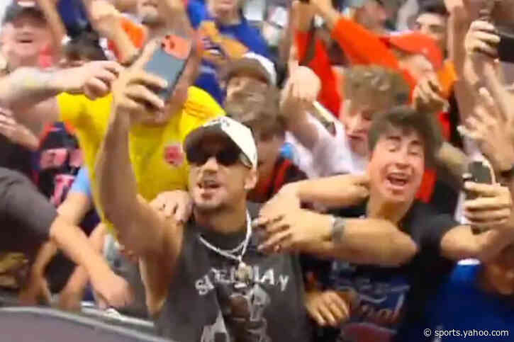 Josh Hart celebrates among fans during wild Knicks parade moment