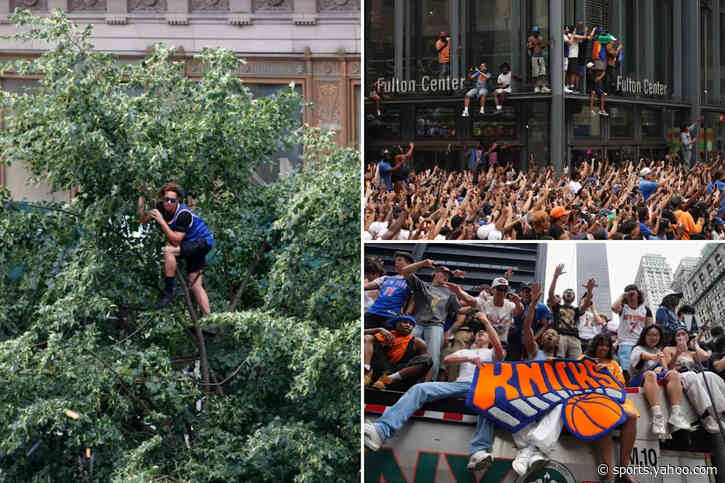 Diehard NYC Knicks fans climb trees, fire escapes, scaffolding and more to catch glimpse of NBA champs
