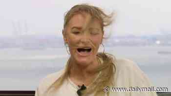 'It's a bit windy, isn't it, Laura Woods?' Hefty gusts strike and threaten to smash ITV's World Cup coverage set