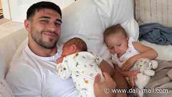 Tommy Fury reflects on the 'most incredible weeks of his life' after the birth of his son Midas - as he looks loved-up with Molly-Mae Hague in sweet snaps