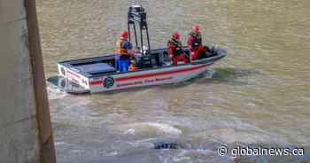 Driver missing after crane goes over bridge and into river in northern Alberta: RCMP