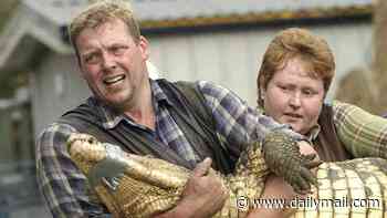 Toddler critical after being 'thrown' into crocodile pit at zoo and 'rescued by owner's wife' - as man is held for attempted murder of three-year-old