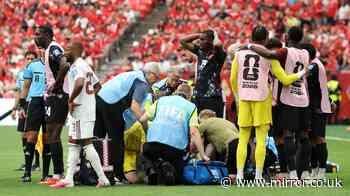 World Cup LIVE: First team confirmed in last 32 after Canada horror injury and VAR penalty drama