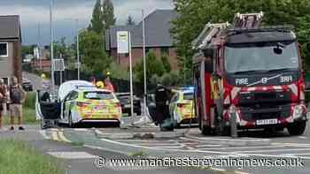 Emergency crews descend on Tameside street after crash involving police car