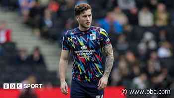 Cheltenham sign midfielder McCann from Barrow