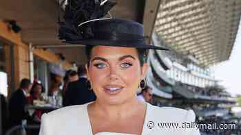 Pregnant Scarlett Moffatt looks effortlessly chic in a white dress as she poses with her fiancé Scott Dobinson at Royal Ascot